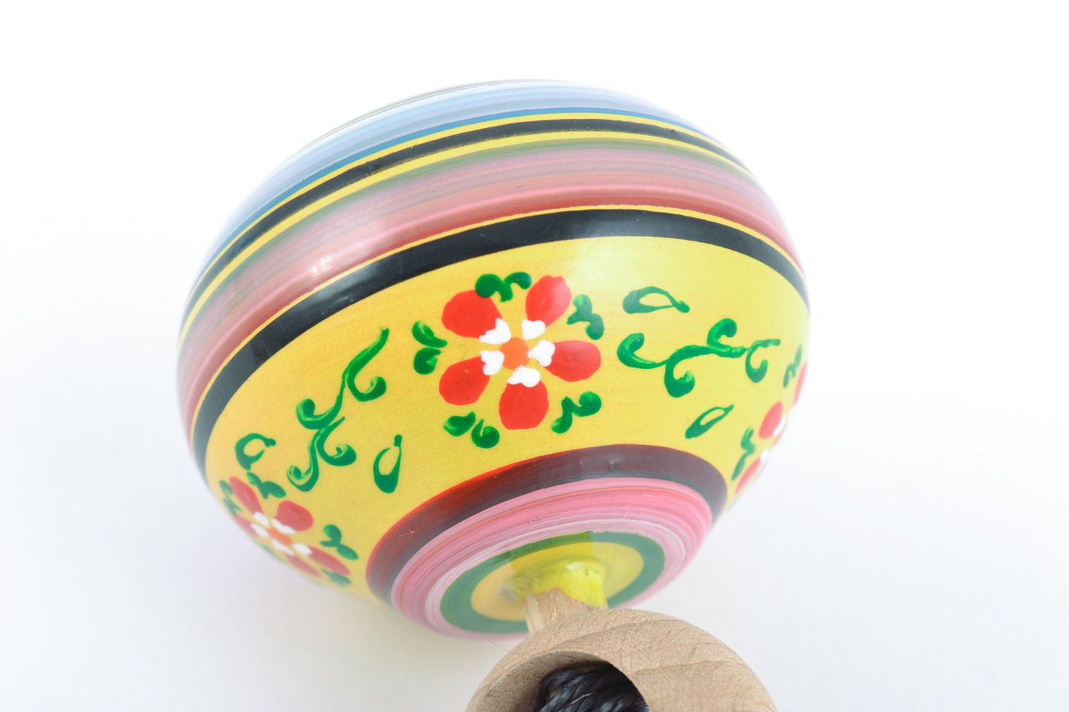 Homemade eco friendly wooden toy spinning top painted with ornaments for kids photo 3