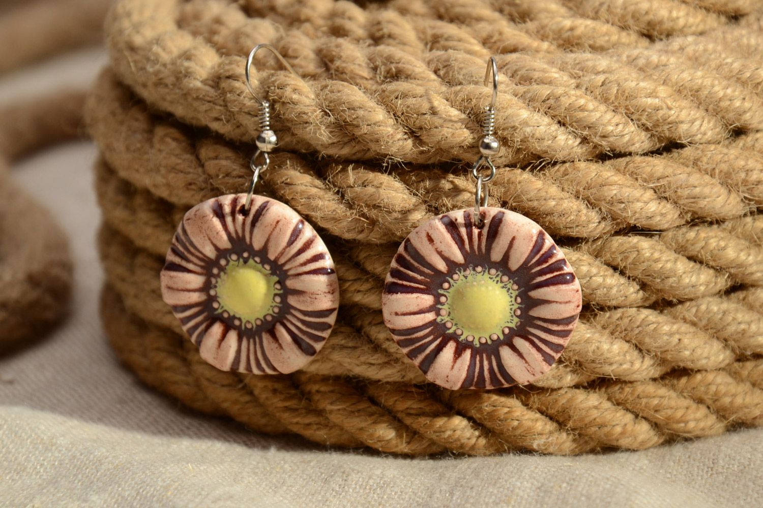 Handmade ceramic round dangle earrings in the shape of flowers painted with enamel photo 1