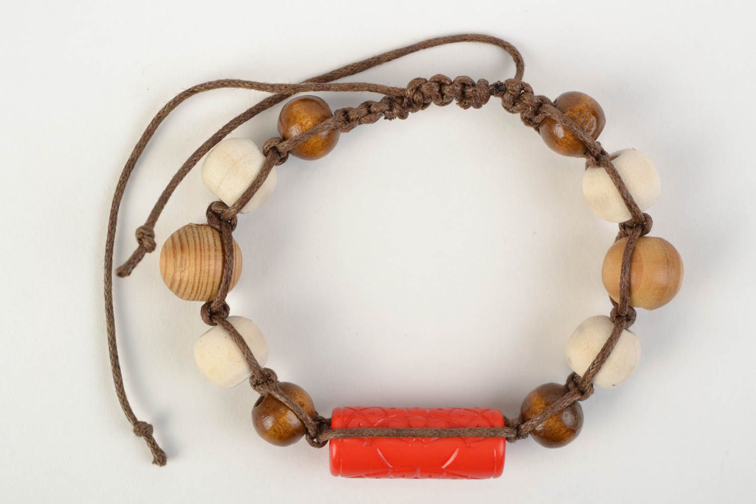 Handmade stylish bracelet with large wooden beads woven of cord red and brown photo 6