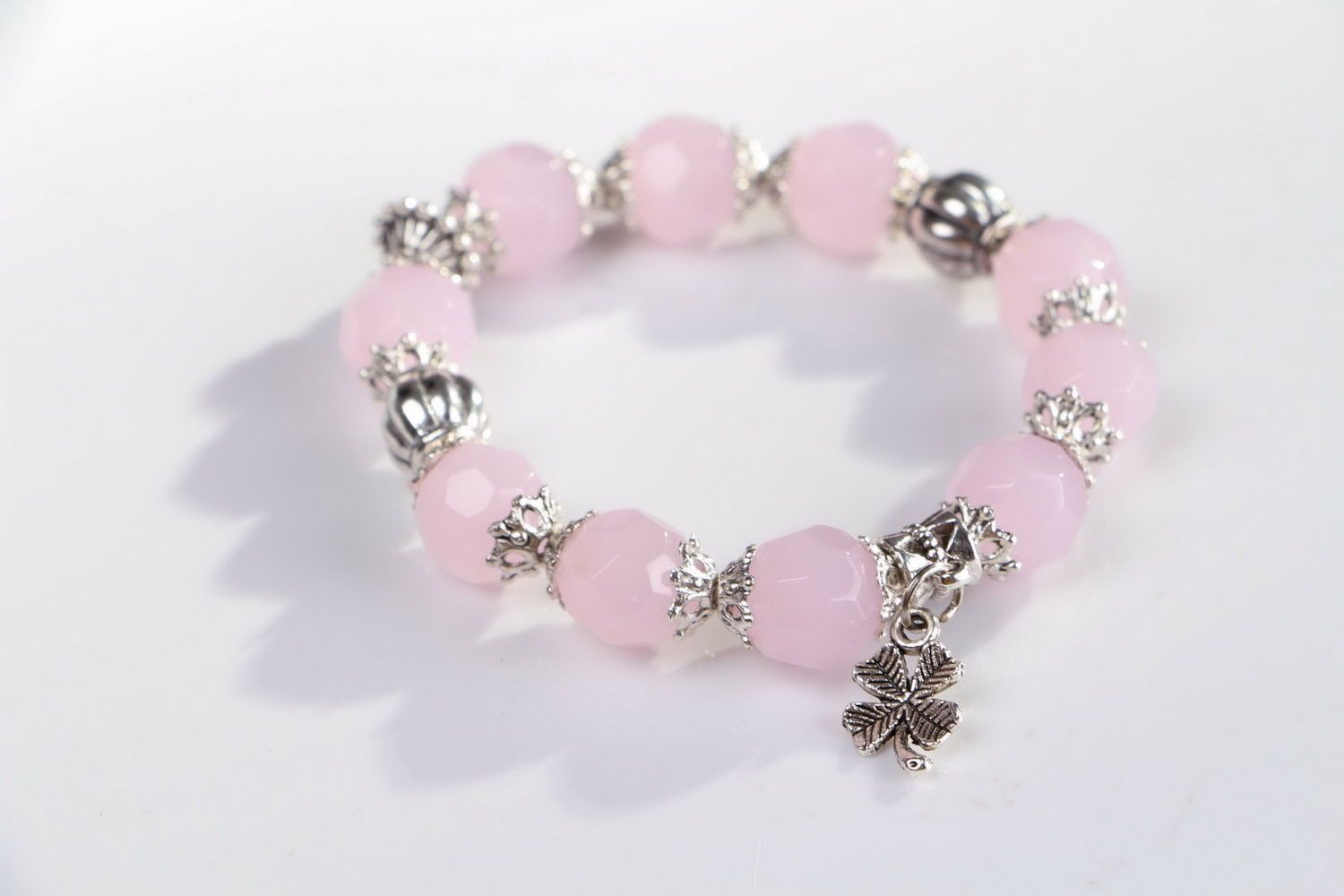 Bracelet with pink quartz and pendants on elastic band photo 2