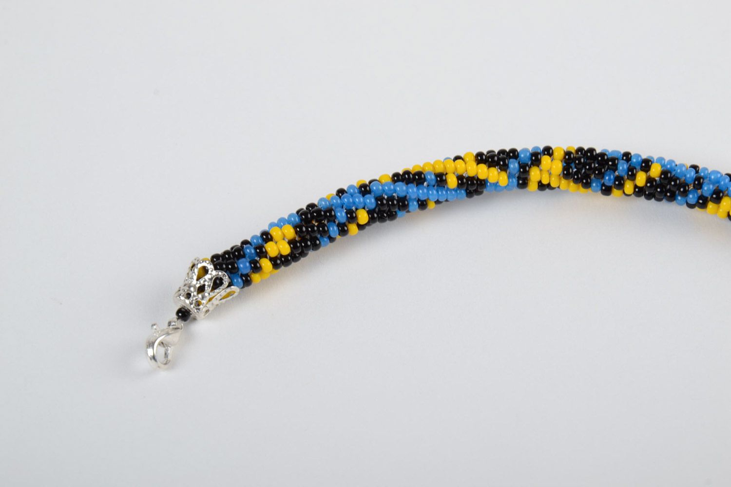 Beautiful bright handmade woven beaded cord bracelet for women photo 3