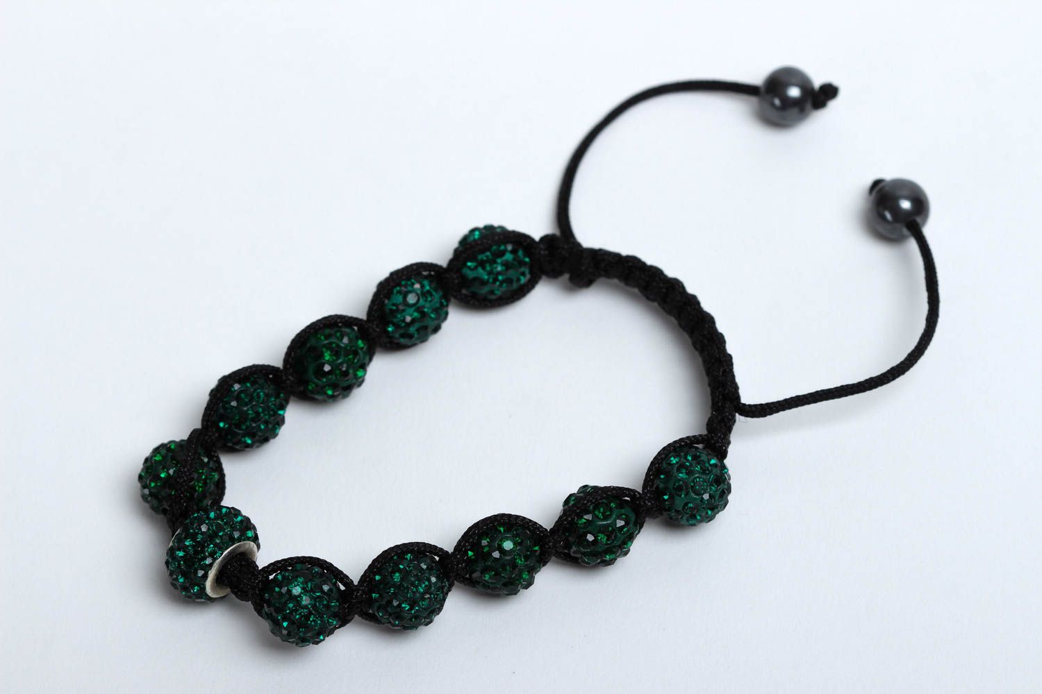 Dark green bead bracelet with strand black cord photo 2