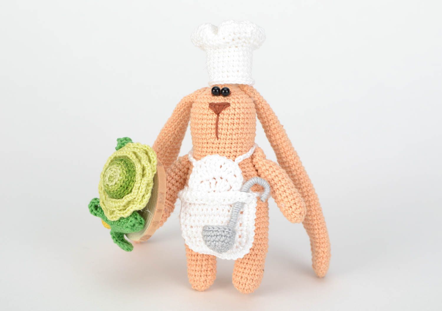 Small handmade crochet soft toy in the shape of the cook hare photo 3