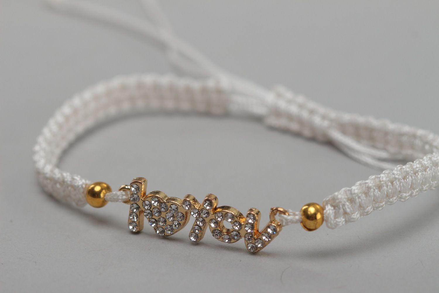 Handmade friendship bracelet woven of white waxed cord with lettering I love you  photo 3