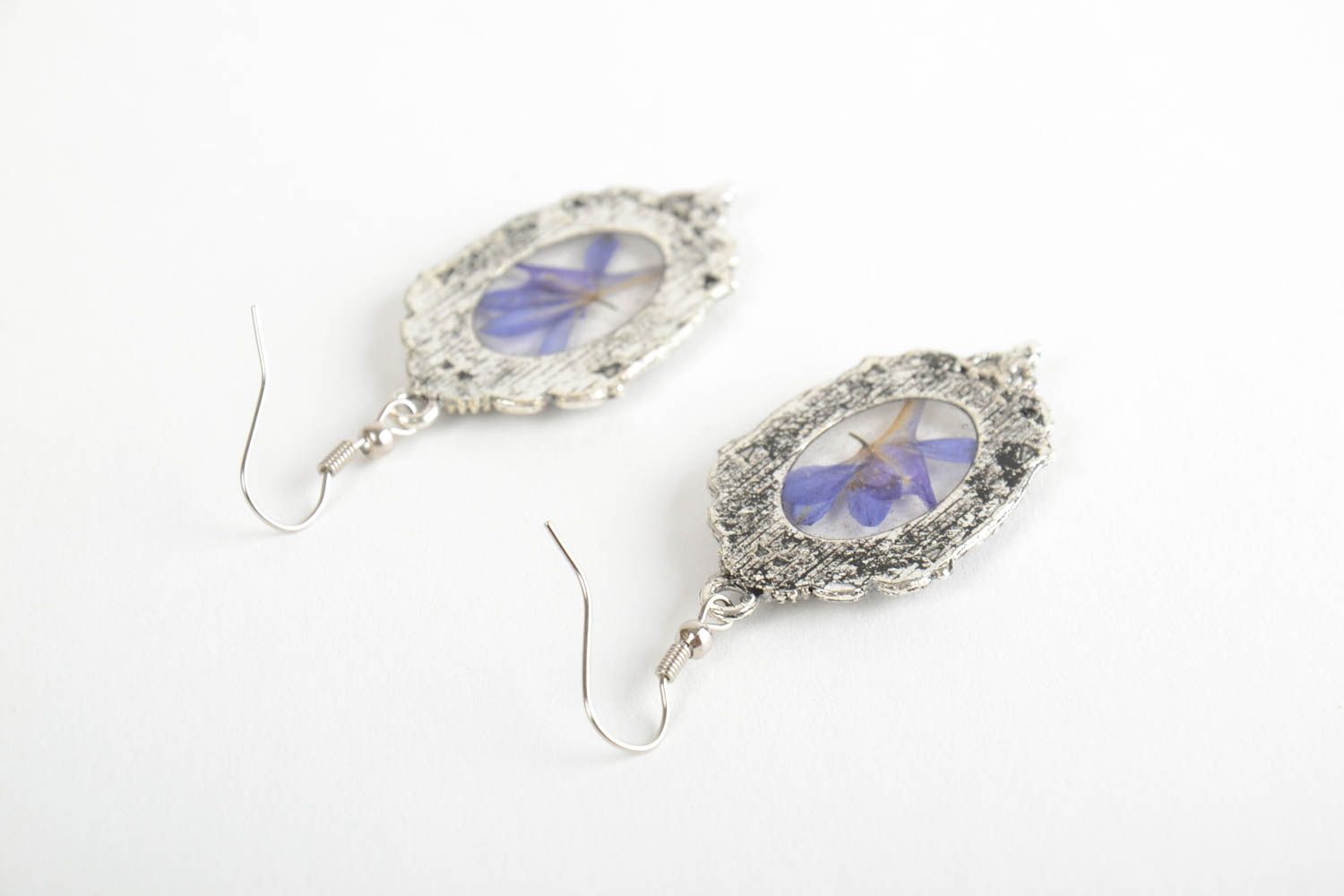 Handmade oval metal earrings in vintage style with flowers in epoxy resin photo 4