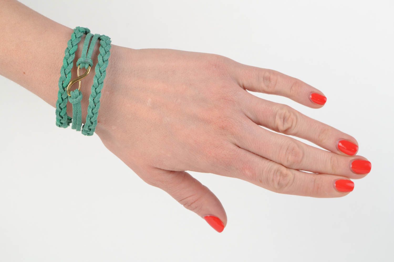Handmade multi row suede cord woven wrist bracelet of turquoise color with charm photo 2