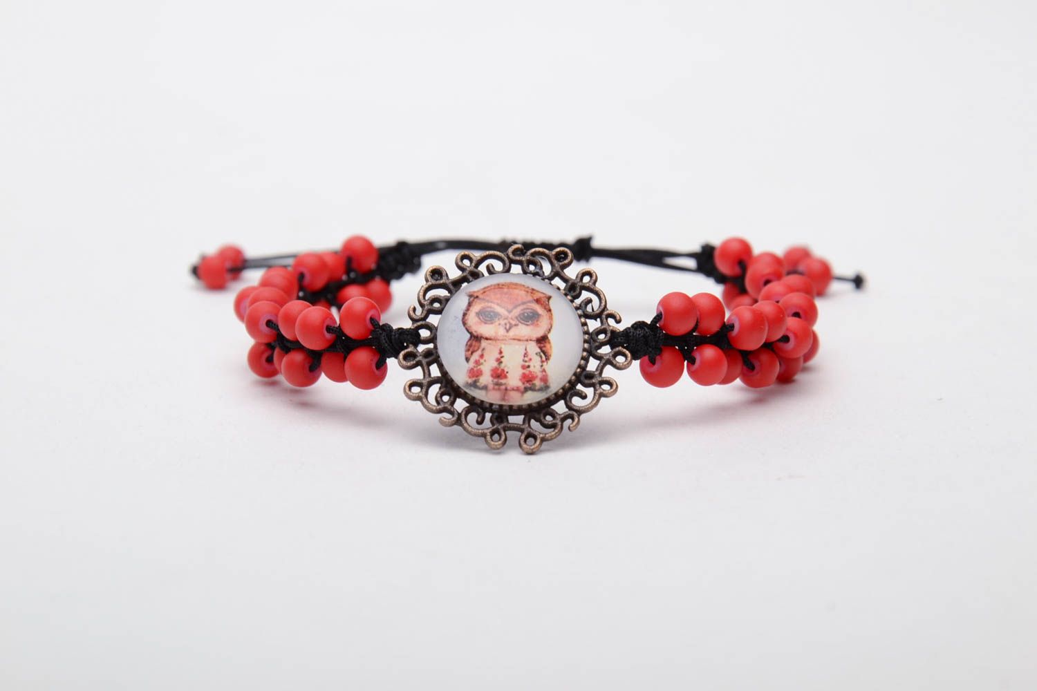 Red bracelet woven of beads photo 3