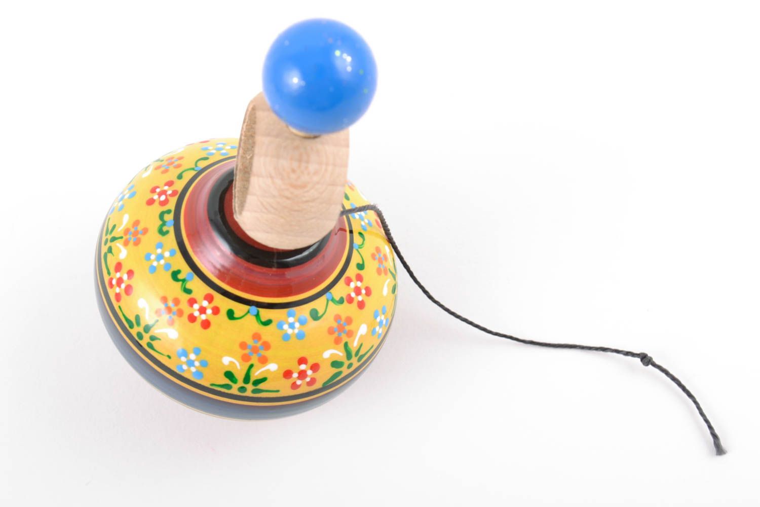 Деревянная игрушка юла с кольцом с росписью красками ручной работы детская фото 5