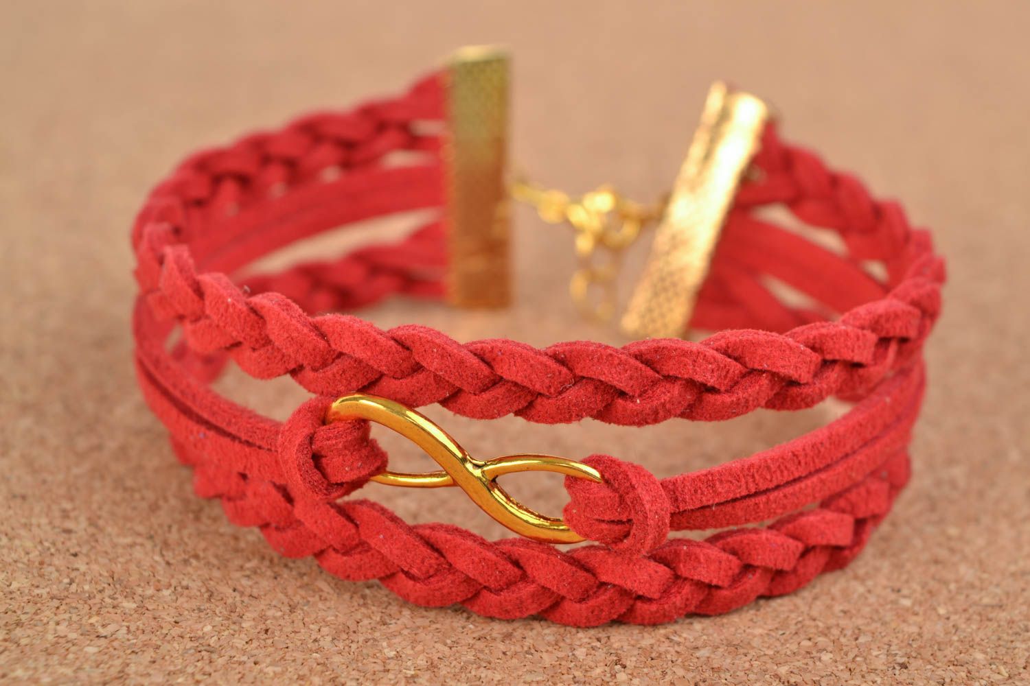 Bright red handmade woven suede bracelet with metal charm photo 1