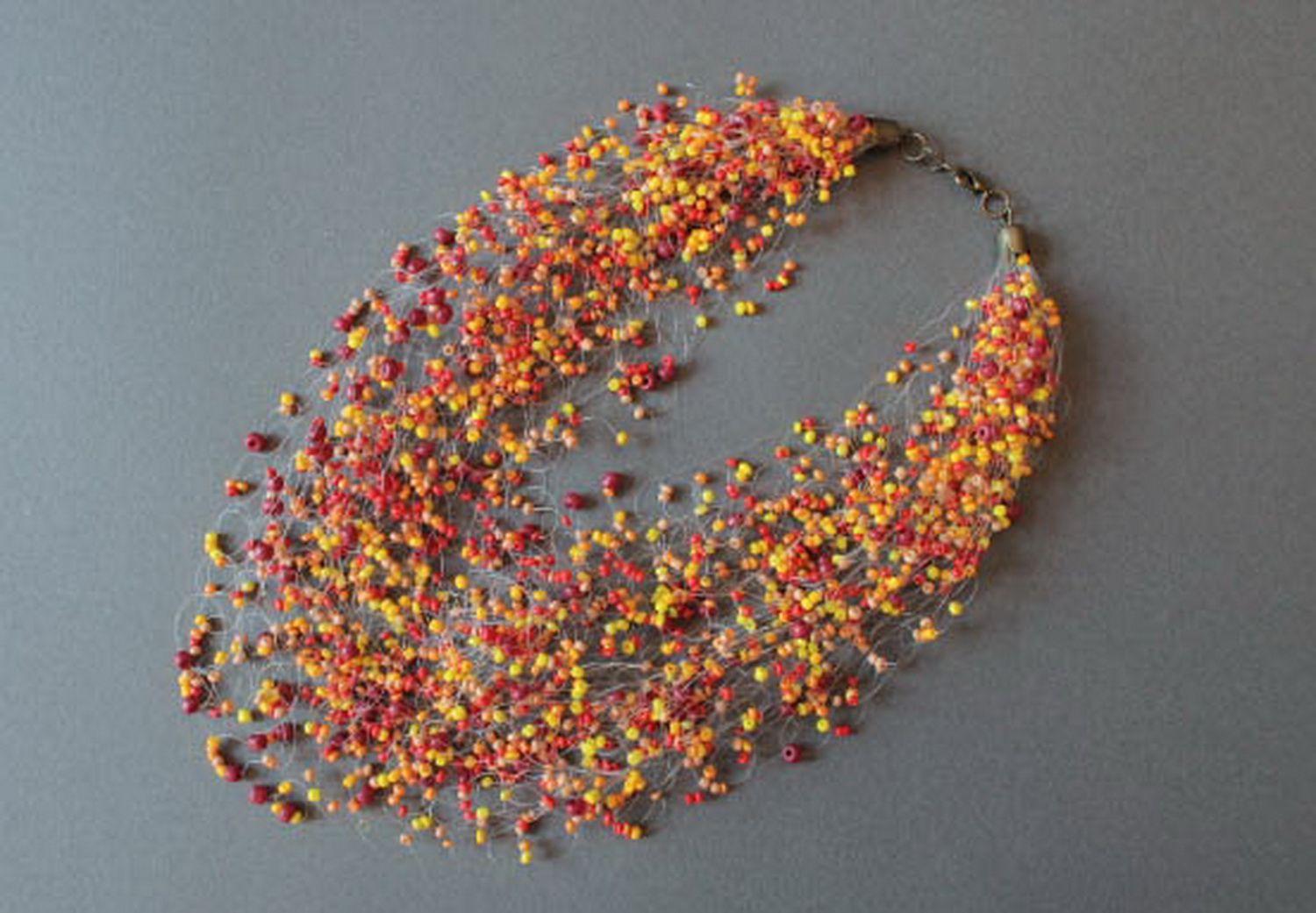 Crochet bead necklace with a fishing line photo 1