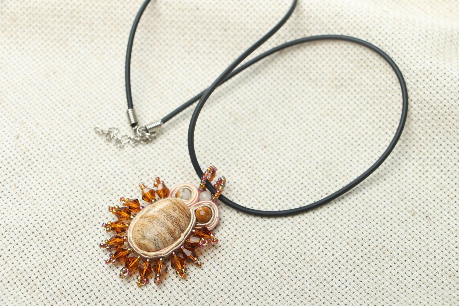 Unusual pendant with natural stones photo 1