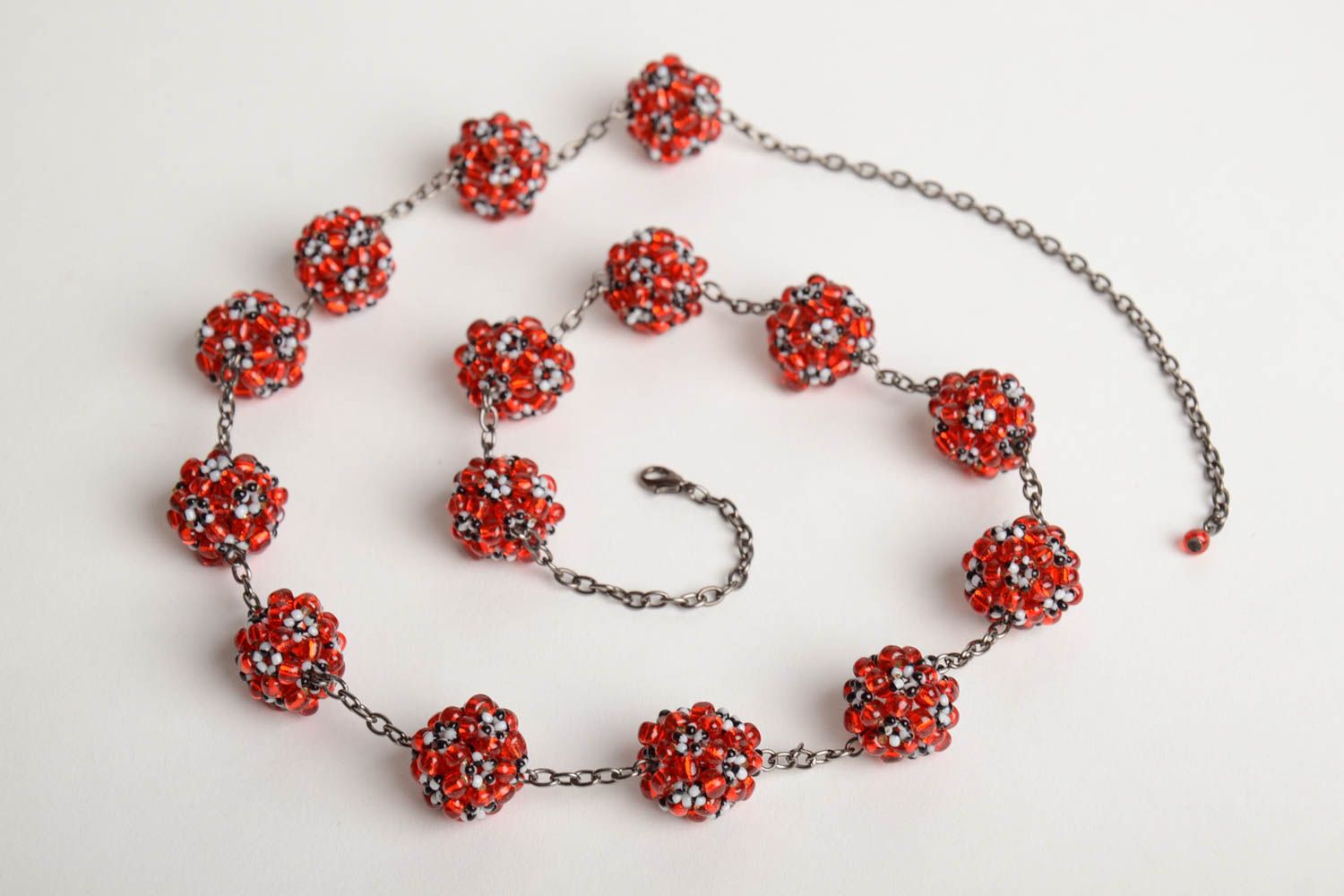 Handmade designer women's necklace on metal chain with red bead woven balls  photo 3