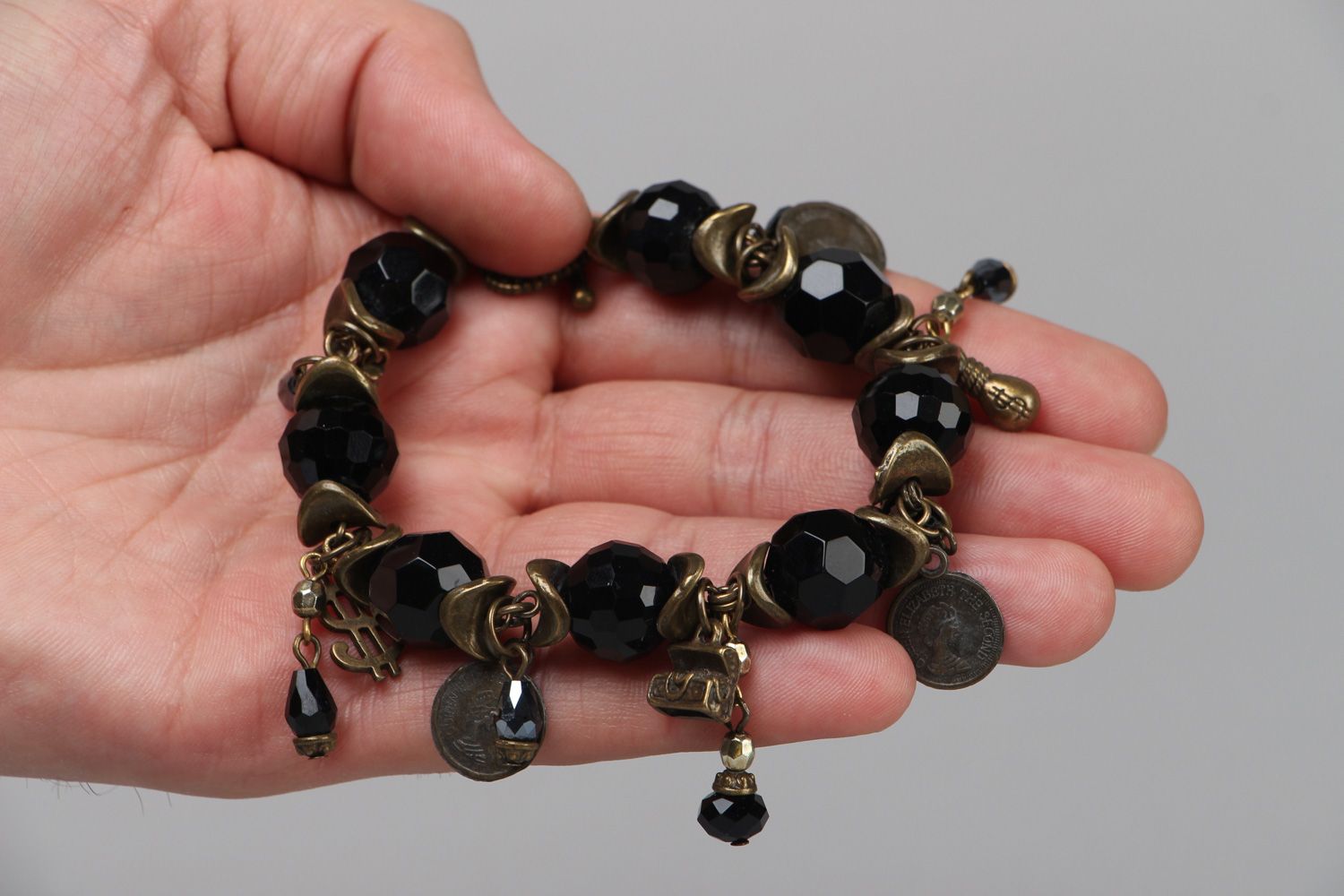 Handmade wrist bead bracelet with glass charms in dark color palette for women photo 3
