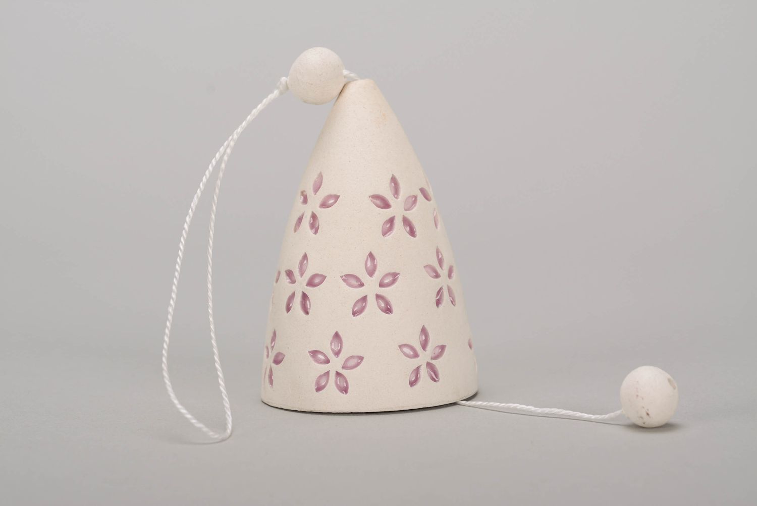 Bell made from white clay photo 3