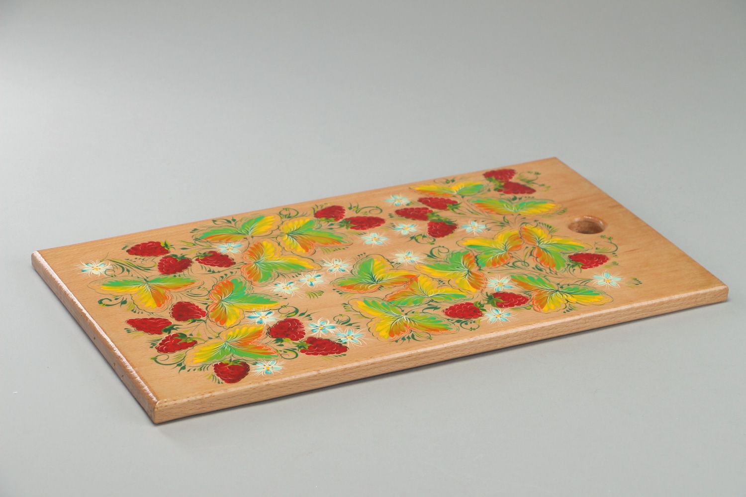 Handmade decorative wooden cutting board with Petrikivka painting in ethnic style photo 3