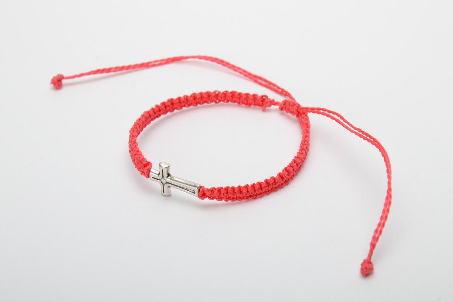 Handmade red friendship wrist bracelet woven of threads with metal cross photo 3