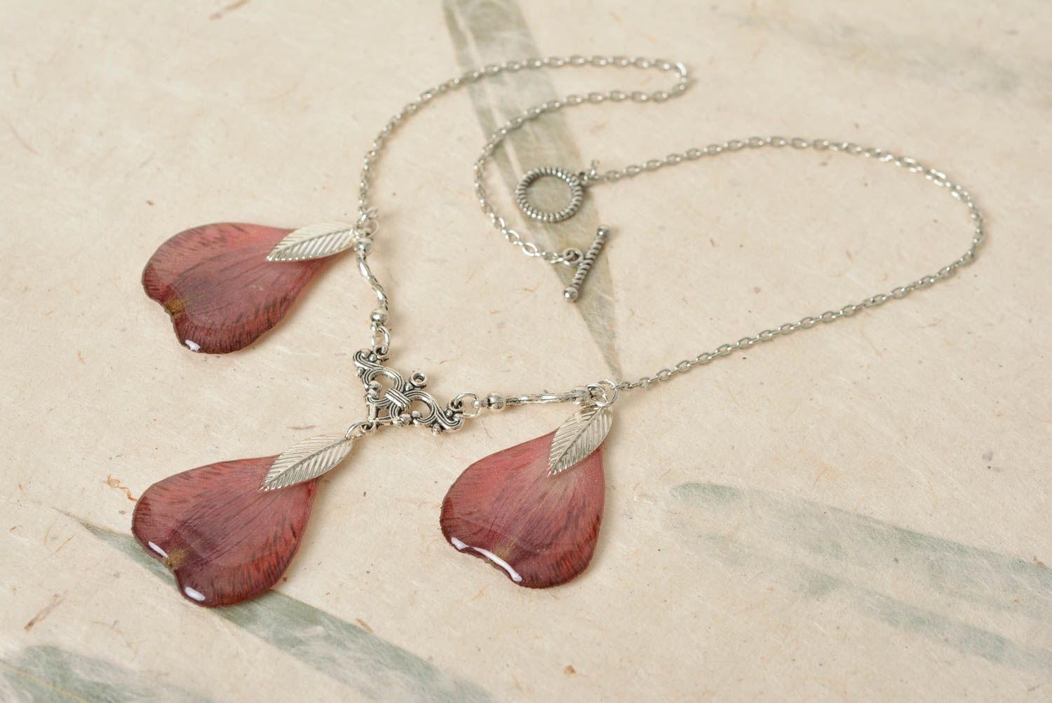 Nice botanical necklace with real flower petals and epoxy coating pink on chain photo 1