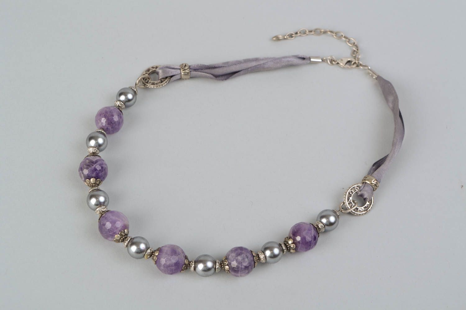 Beautiful necklace with natural stones of lilac color photo 1