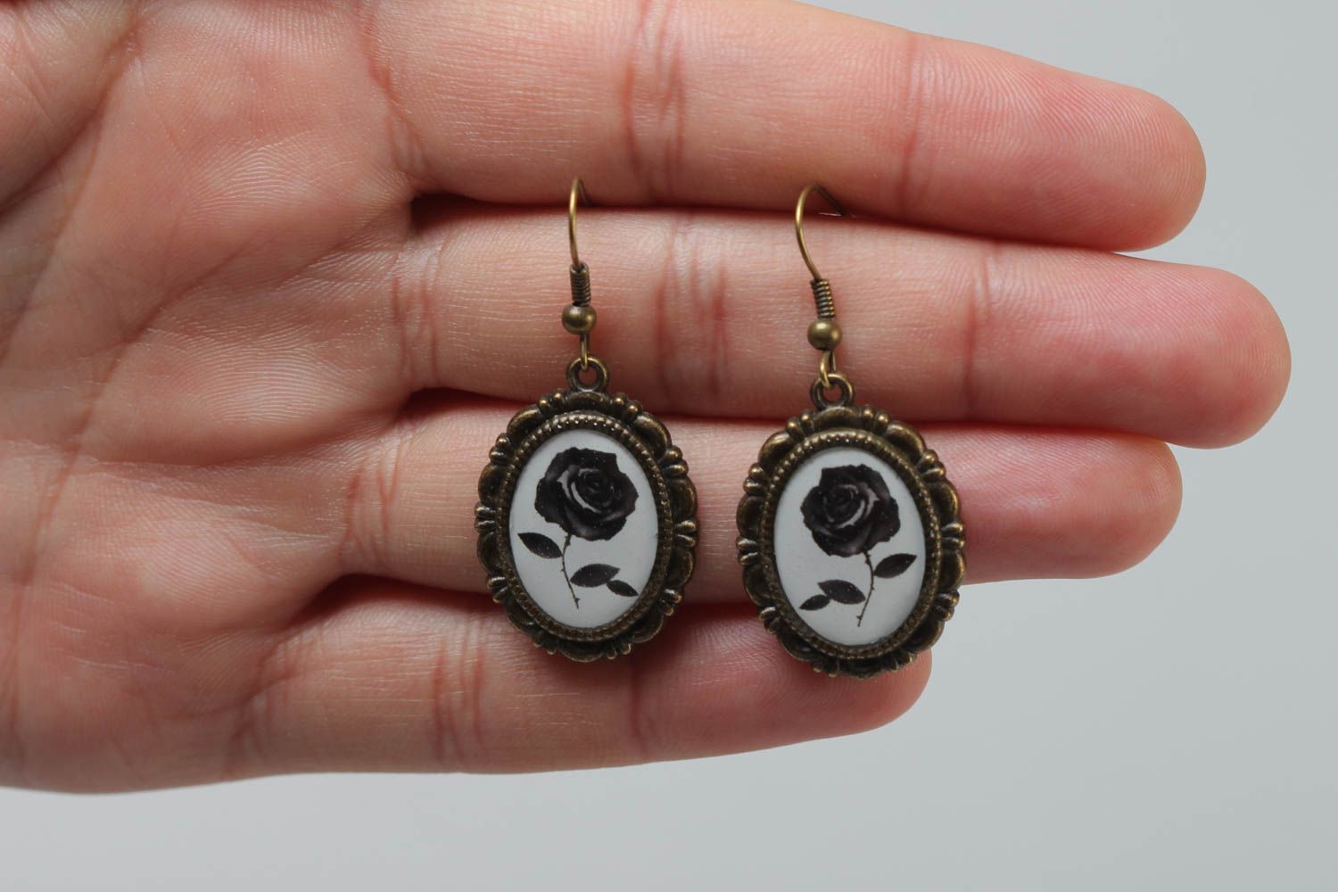 Handmade oval metal earrings with imagery of black roses coated with glass glaze photo 5