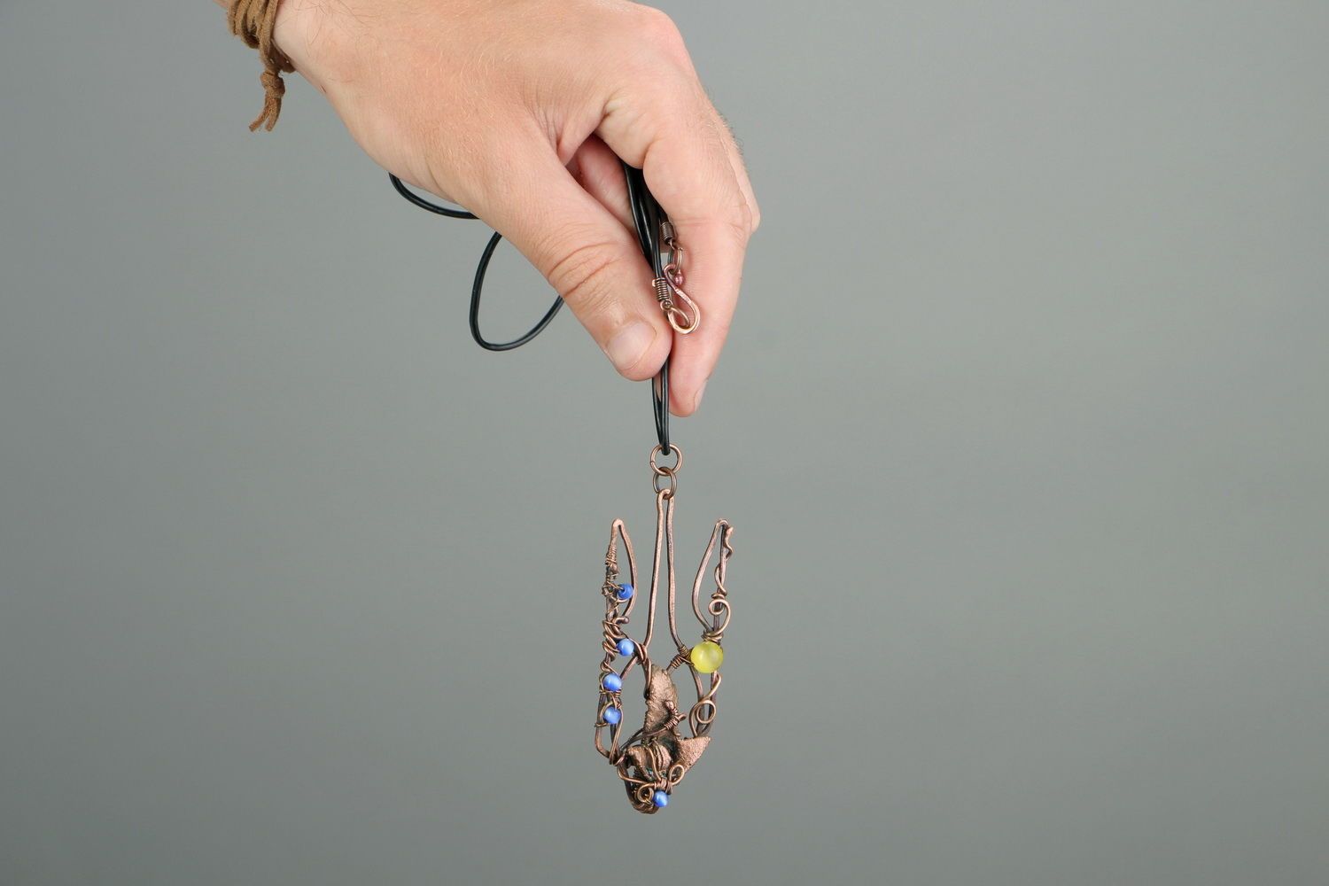 Copper pendant with cat's eye stone photo 5