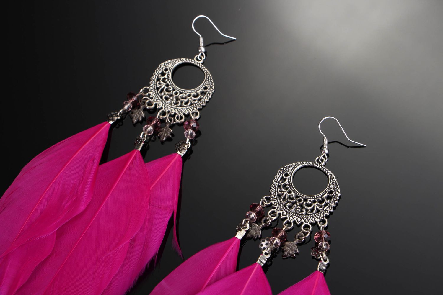 Ethnic earrings with feathers photo 1