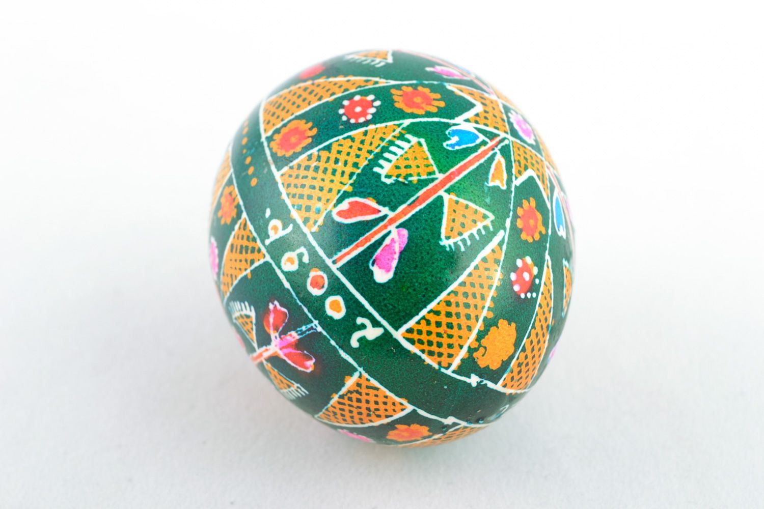 Homemade green Easter egg painted with hot wax photo 4