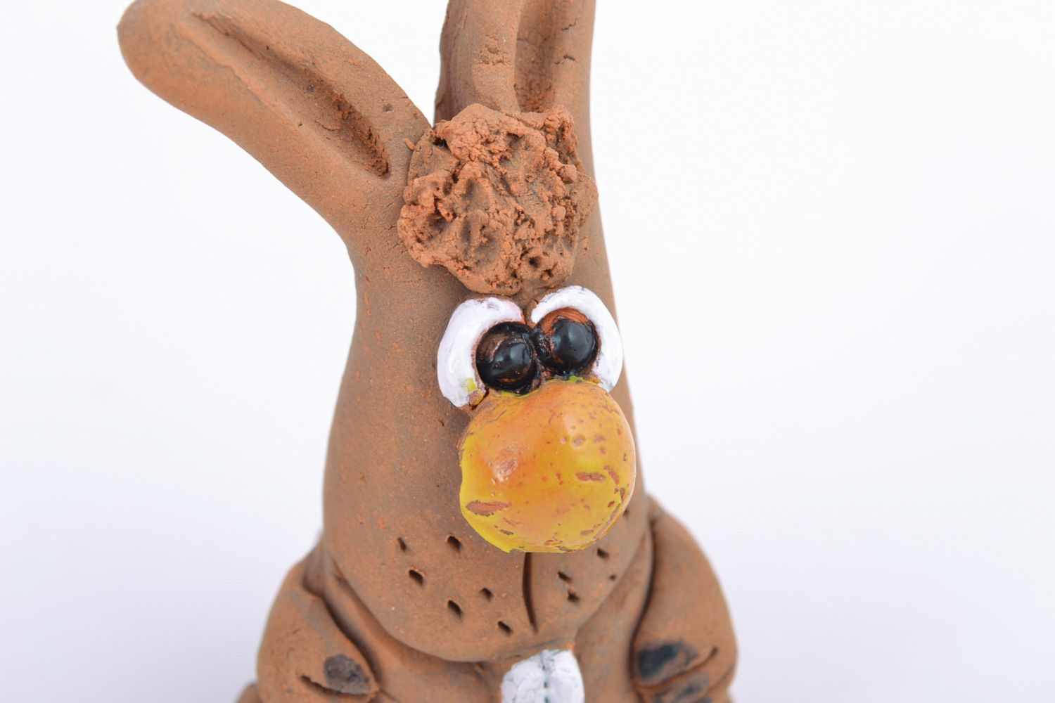 Small funny handmade ceramic figurine of rabbit coated with glaze for present photo 3