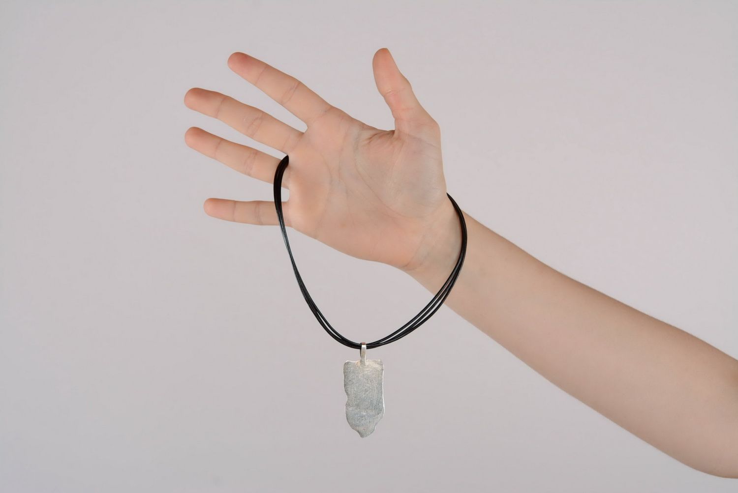 Silver pendant with cow horn photo 3