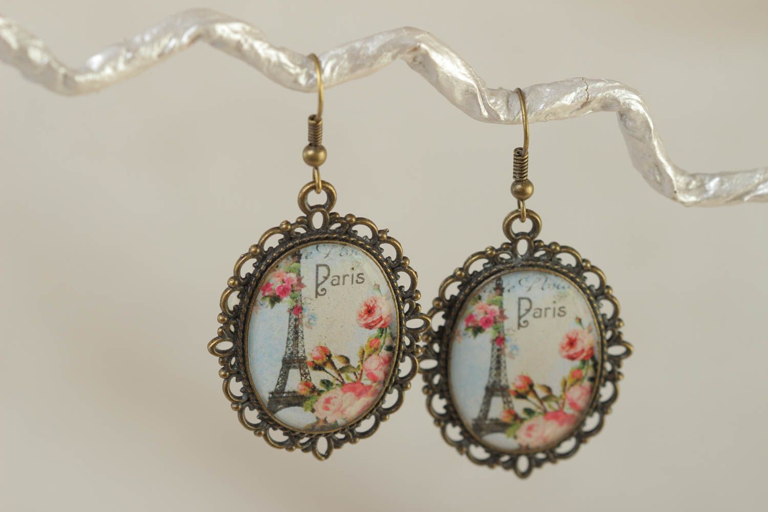 Handmade beautiful earrings with Eiffel Tower prints oval openwork accessory photo 1