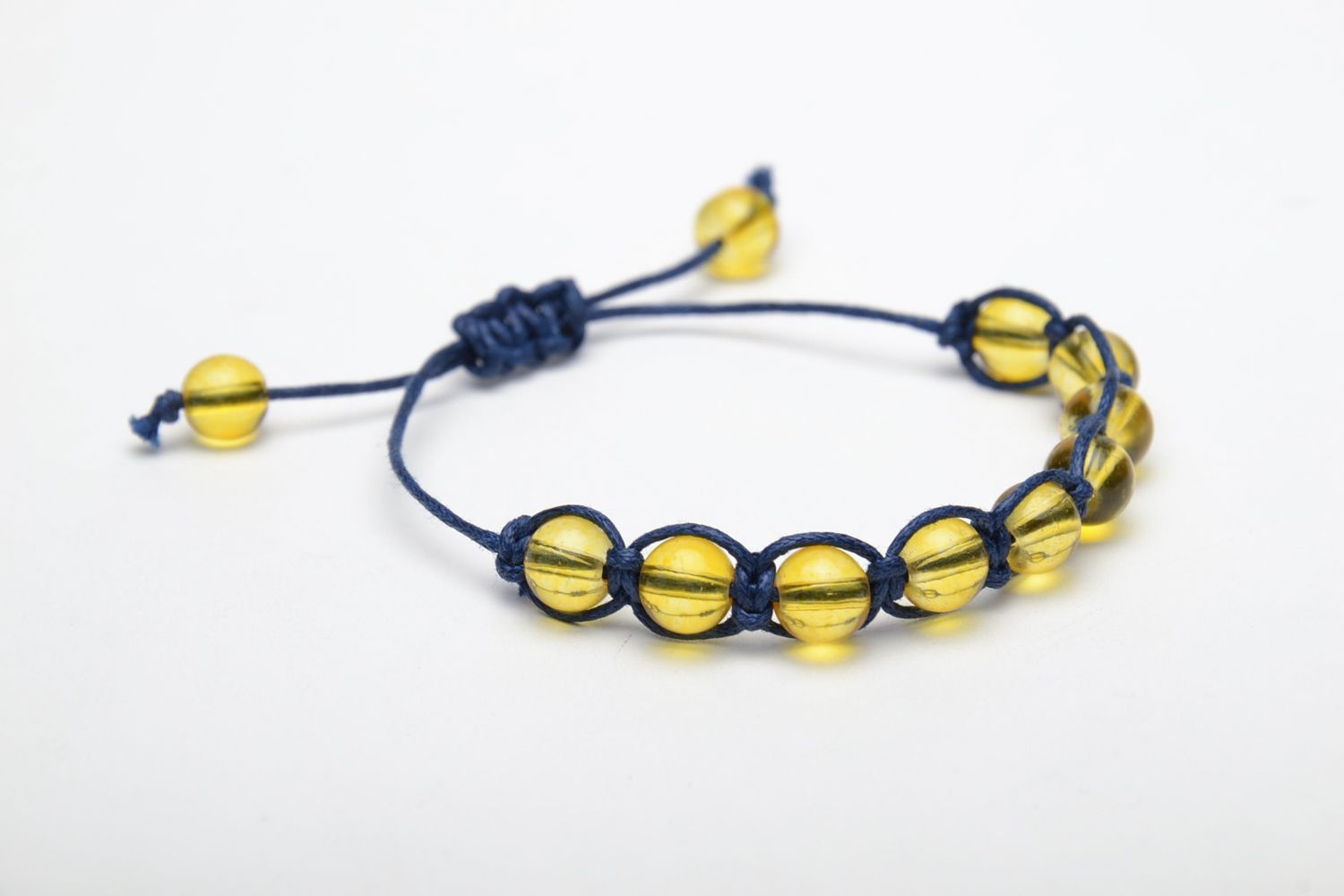 Bracelet en perles de verre jaunes tressé de lacet ciré bleu femme fait main photo 3