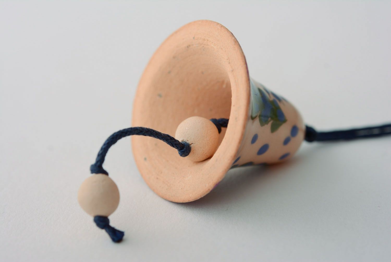 Small ceramic bell with a cord photo 5