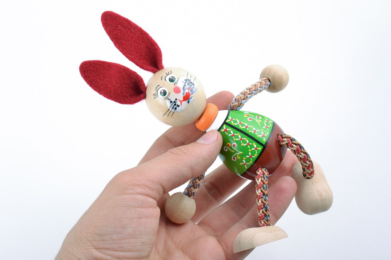 Painted eco friendly wooden homemade eco toy rabbit with red ears for children photo 2