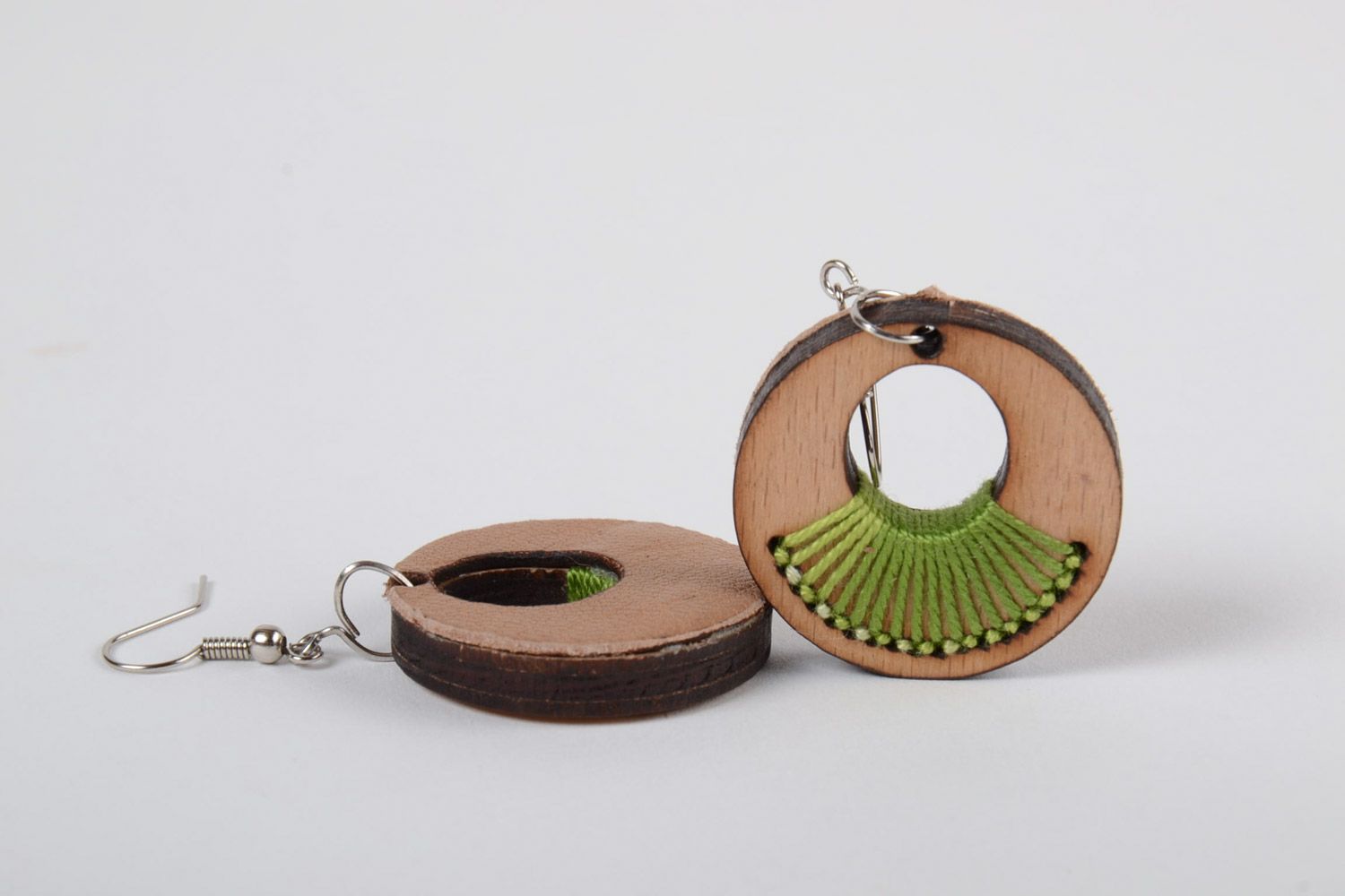 Handmade round shaped plywood earrings with green embroidery  photo 4