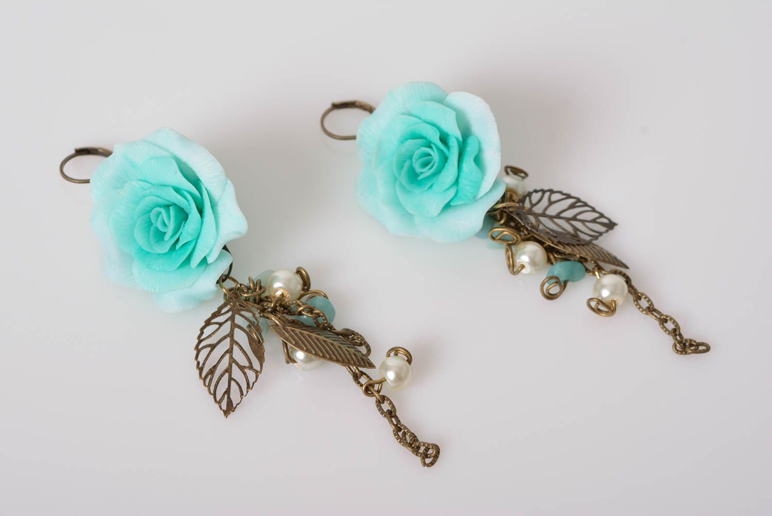 Handmade designer dangle earrings with polymer clay flowers of mint color photo 1