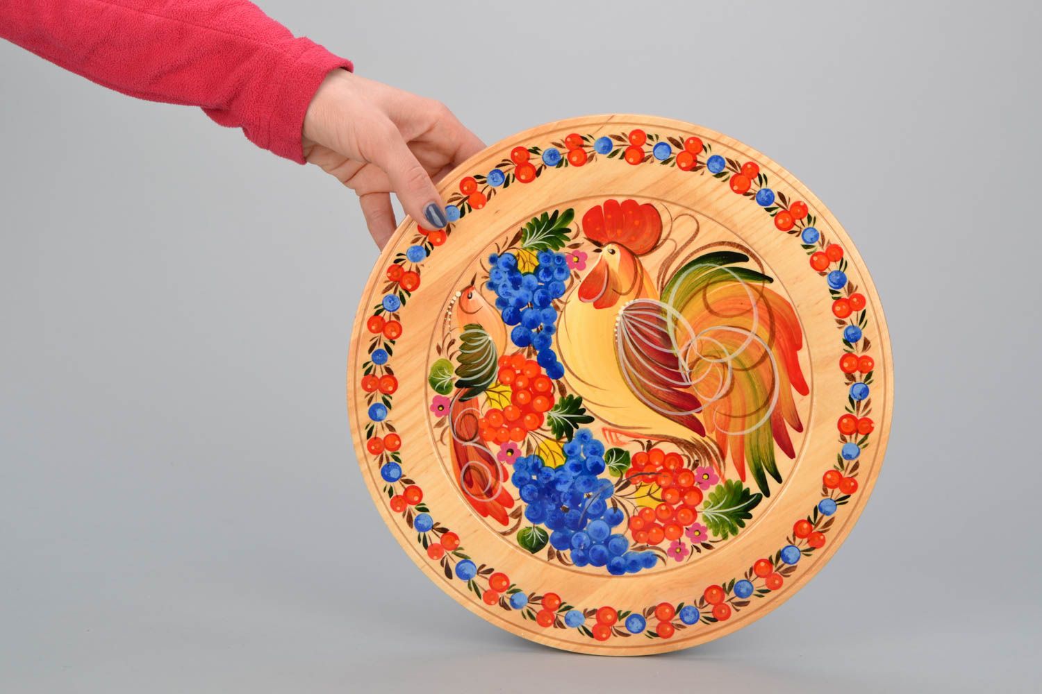 Decorative plate with Petrikivka painting photo 2