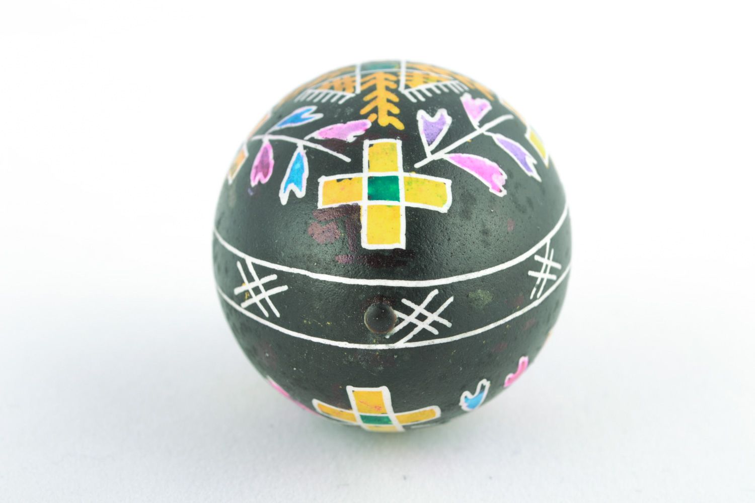 Handmade ornamented Easter egg painted using waxing technique photo 5