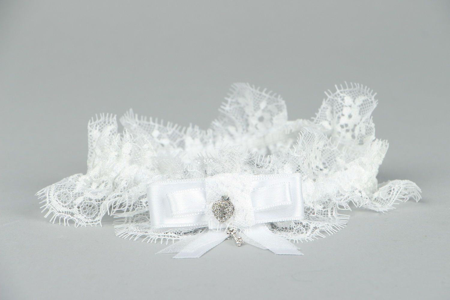 Lace garter for bride with rhinestones photo 3