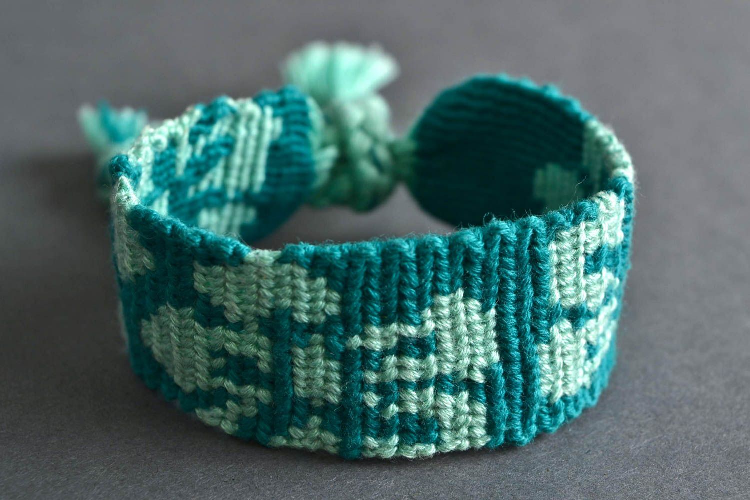 Handmade designer macrame woven wrist bracelet of turquoise color for women photo 1