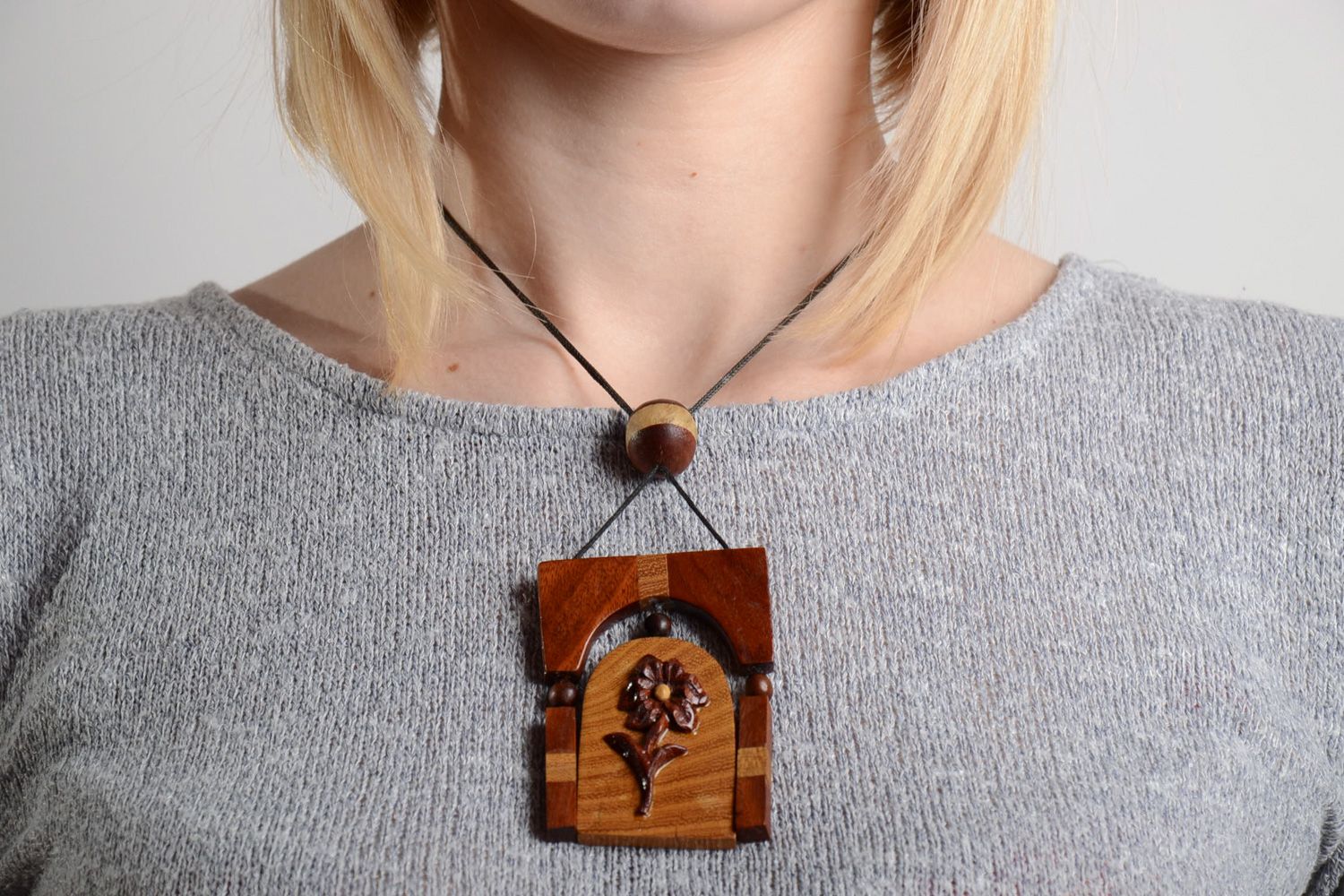 Handmade neck pendant carved of wood and decorated with volume inlay for women photo 2