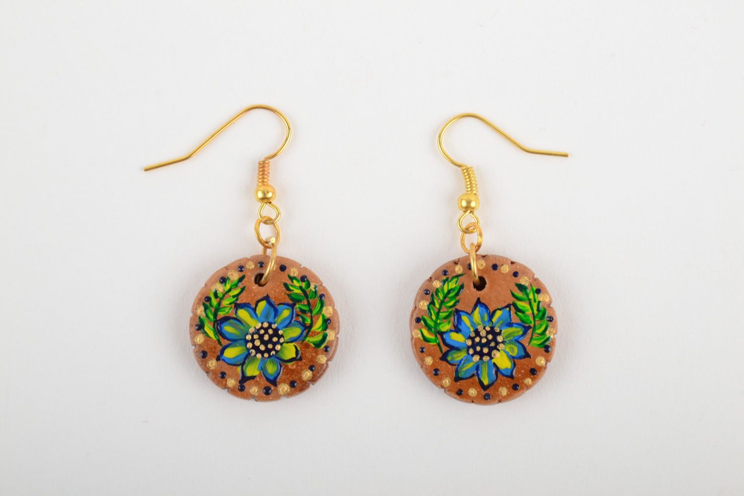 Handmade festive round ceramic earrings painted with acrylics in ethnic style photo 5