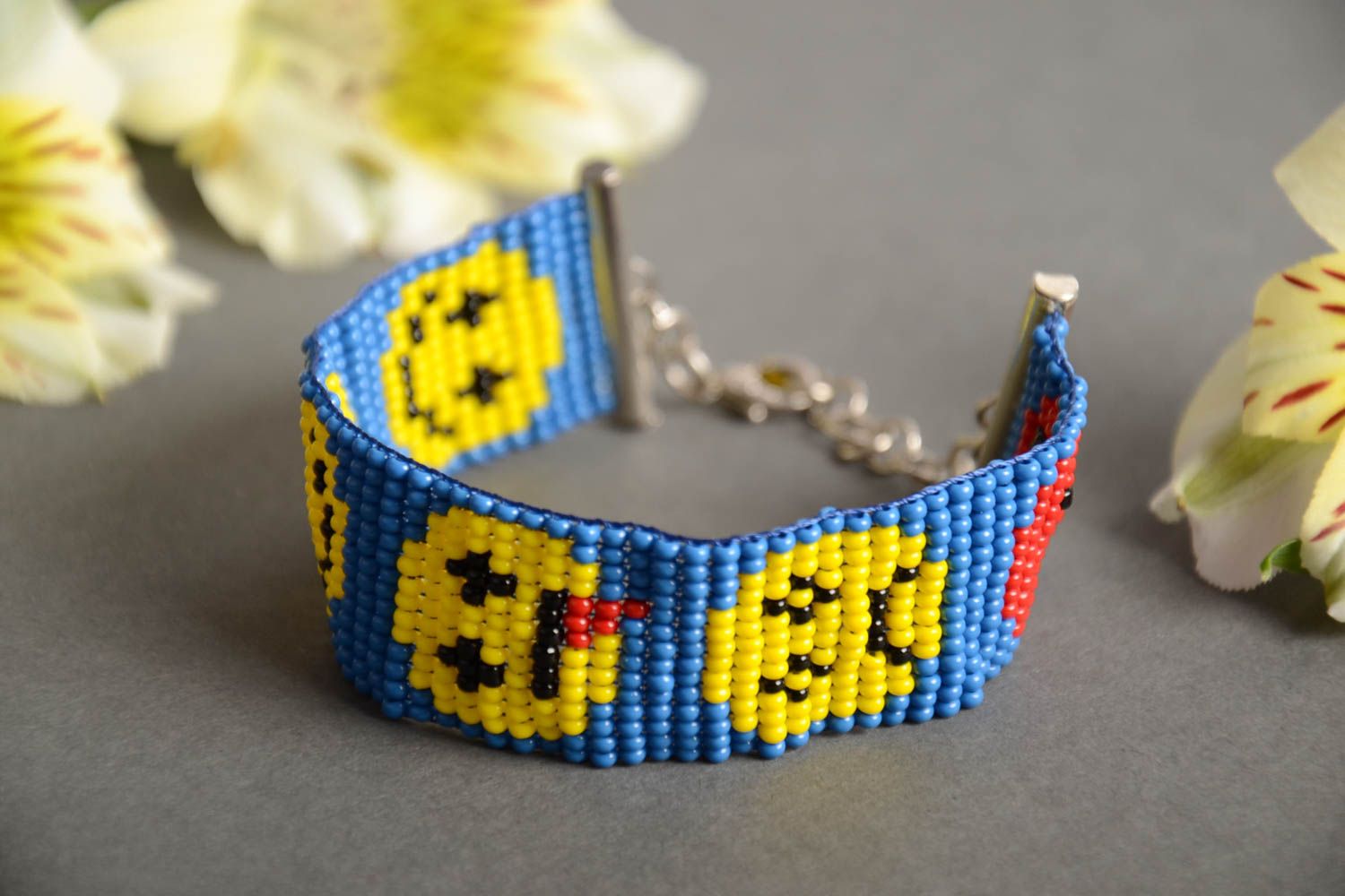 Funny colorful yellow and blue beads woven wrist chain bracelet with a smiley pattern photo 1