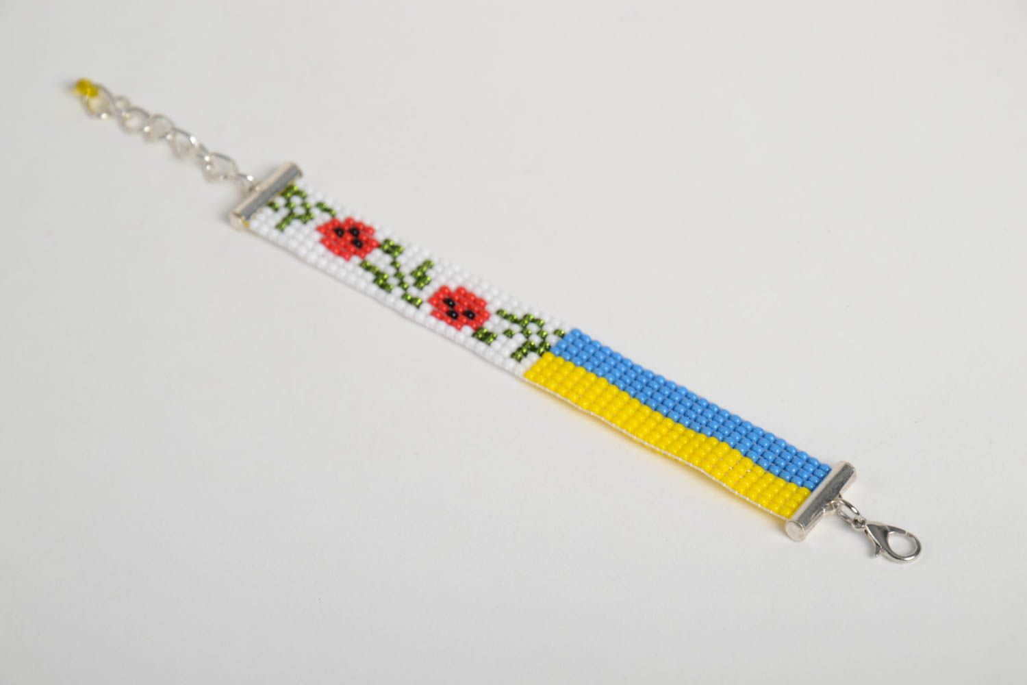 Bright beaded bracelet with the Ukrainian flag and floral ornament photo 3