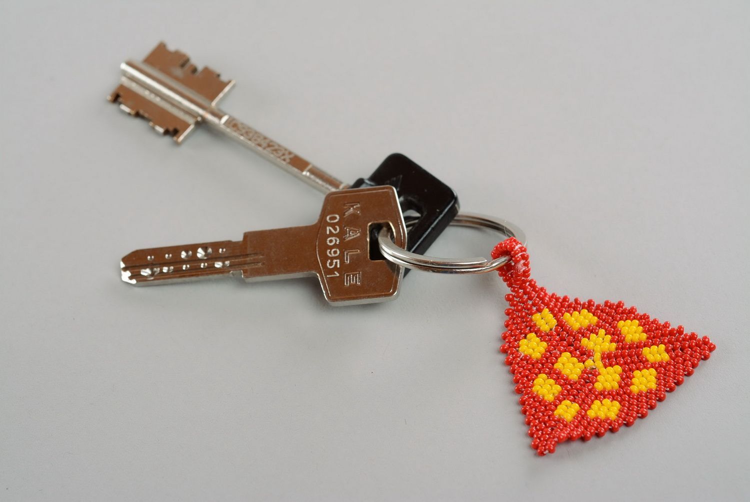 Porte clés en perles de rocailles orange fait main photo 1