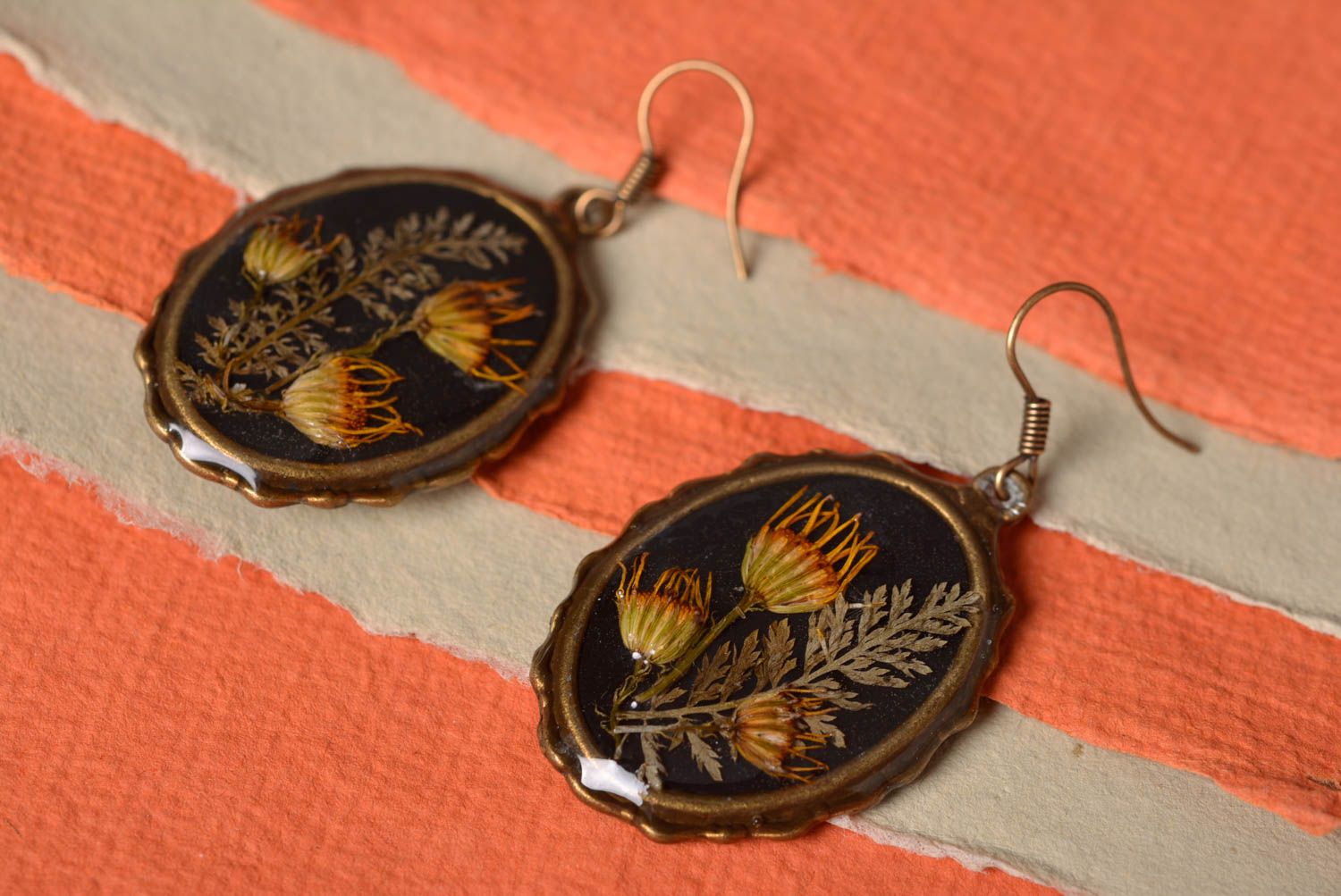 Designer earrings with dried flowers in epoxy resin handmade oval-shaped jewerly photo 1