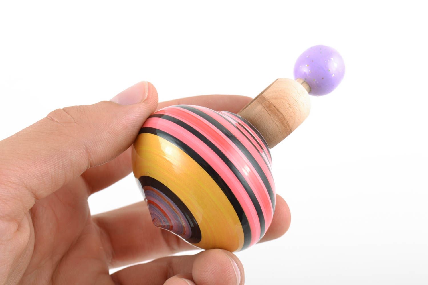 Bright small striped handmade wooden spinning top for children photo 2