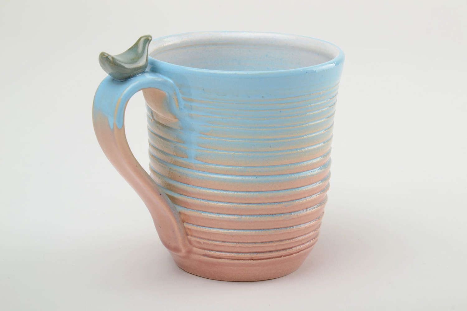 10 oz porcelain handmade drinking cup in blue, white, and beige colors with handle photo 3