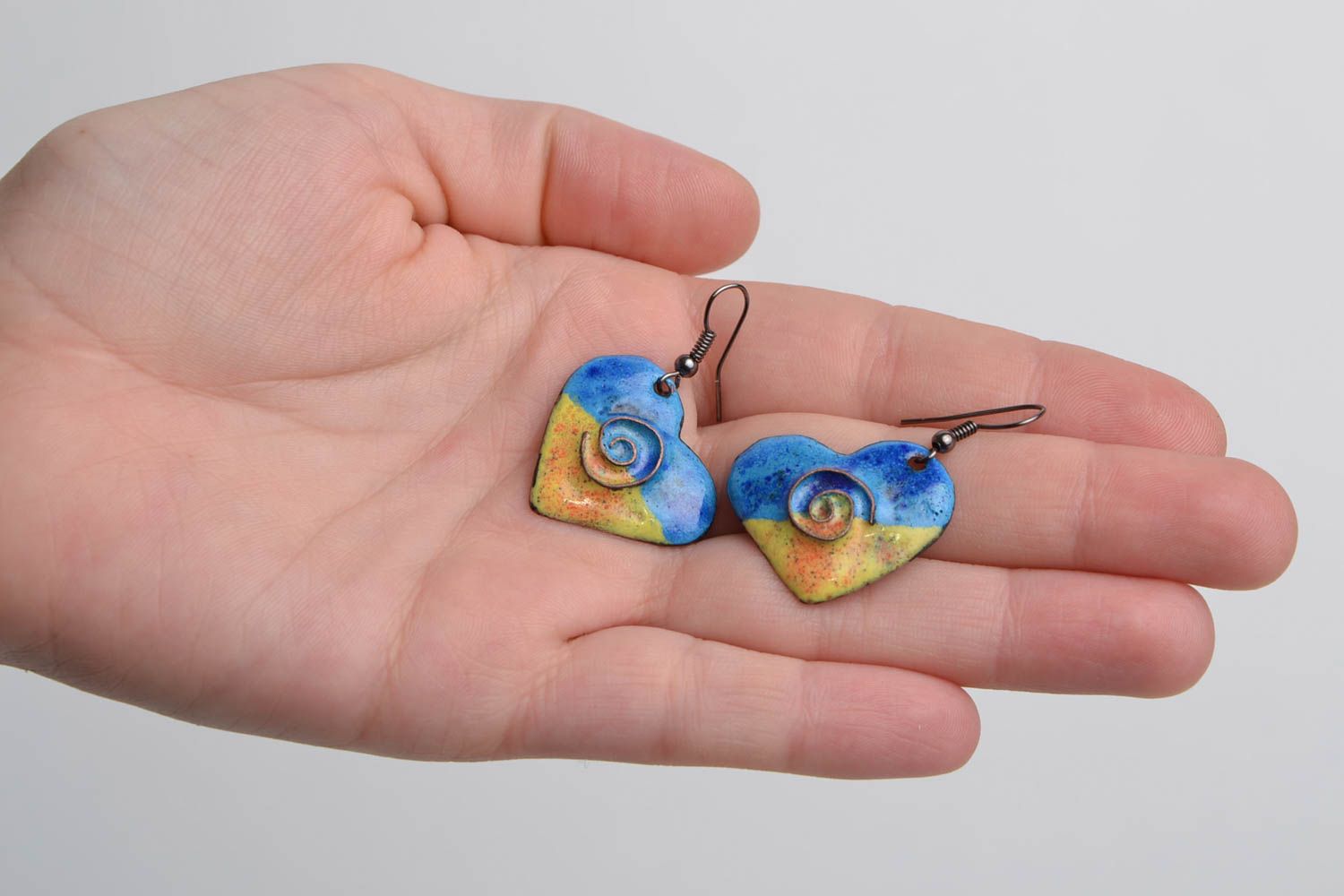 Handmade heart shaped small copper earrings with blue and yellow enamel coating photo 2