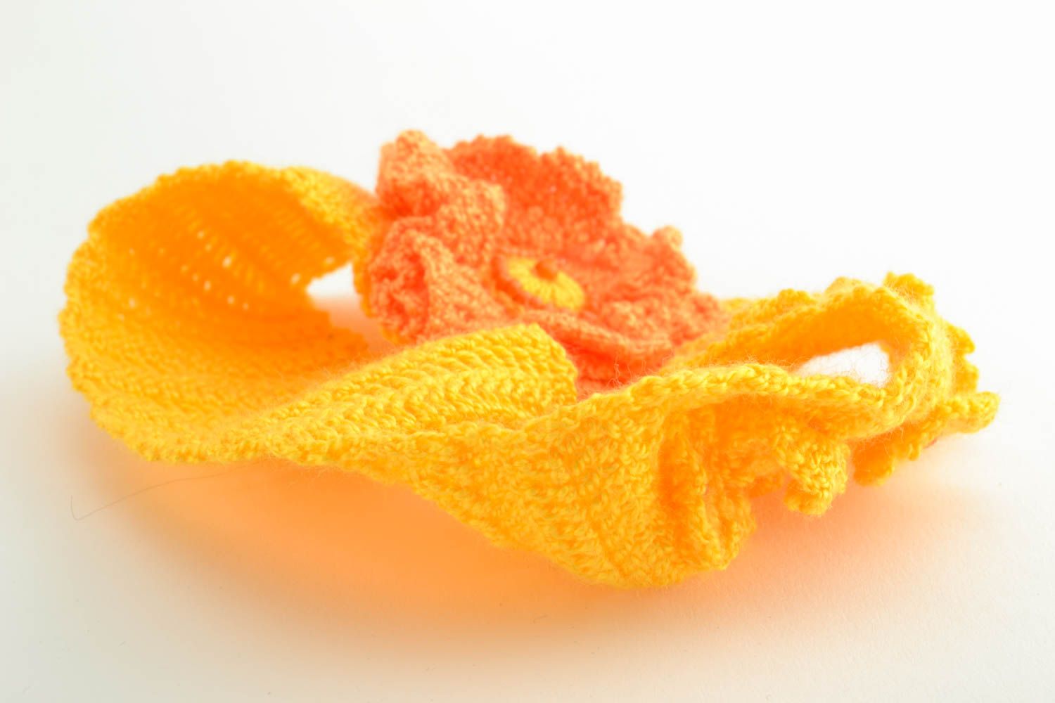 Bandeau à cheveux tricoté accessoire fait main orange avec fleur pour enfant photo 3