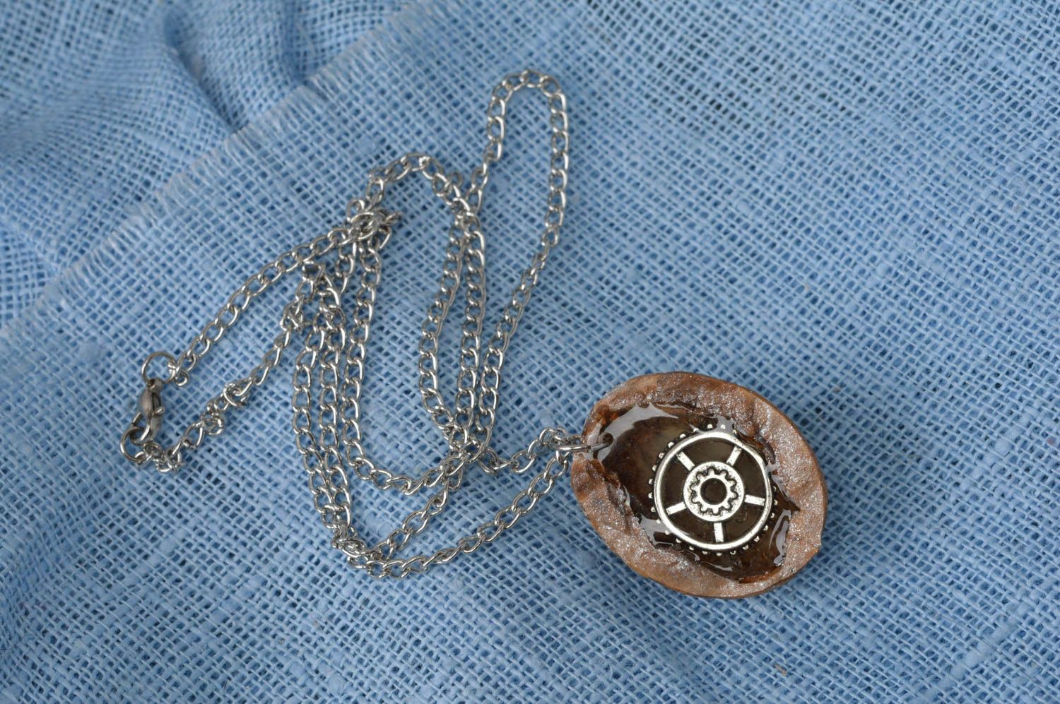 Handmade cute luminous unusual pendant made of nut with pinion on chain photo 2