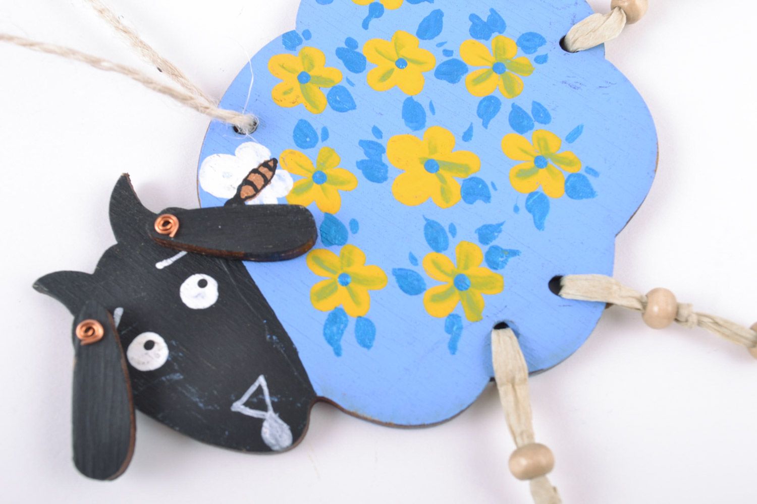 Homemade decorative painted wooden wall hanging blue lamb with yellow flowers photo 2